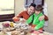 Father and son having lunch in a chalet