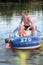 Father with son in inflatable boat