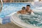 Father and son in jacuzzi