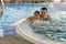 Father and son in jacuzzi