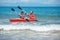 Father and son kayaking in ocean. Active vacation with young kid. Holiday activity with schoolboy child