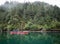 Father and son kayaking in Resurrection Bay, near Seward, Alaska