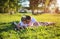 Father and son lying on the grass in weekend, family, vacation