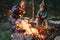 Father with son makes campfire in forest