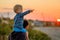 Father and son outdoor portrait in sunset sunlight