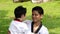 Father and son palying together in karate sport suite at the outdoor park