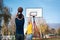 Father and son playing basketball in the park