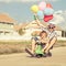 Father and son playing near a house