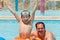Father with son in pool