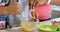 Father and son pouring flour into bowl and mother whisking eggs 4k