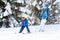 Father and son, preschool child, skiing in austrian ski resort i