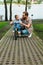 father and son with small bike looking at each other