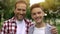 Father and son smiling and looking at camera, teeth health, dentalcare whitening
