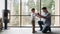 Father and son spending time together, man throwing up his son at home in living room, copy space. Father`s day concept