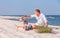Father with son spent time together on the sea sand beach in sun