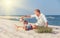 Father with son spent time together on the sea sand beach in sun