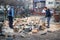 Father and son splitting wood