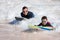 Father and son surfing