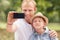 Father with son take self photo