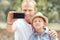 Father with son take self photo