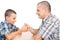 Father and son thumb wrestling