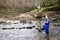 Father and son together catching trout