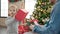 Father and son unpacking christmas gift at home