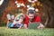 father and son use modern communication technology in park. family blog.