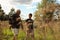 Father and son walking in a field