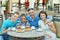 Father and sons having breakfast