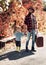Father with suitcase and his son. Bearded dad telling son about travelling. Traveler with lot experience. Spirit of