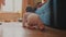father teaches baby to crawl. happy family a first steps kid dream concept. father helps baby newborn crawling on the