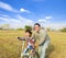 Father teaching little girl to ride bicycle