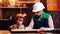 Father teaching little son to use carpenter tools and hammering. Parent shows his little child how to use hammer.