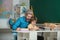 Father teaching son. Young happy family father and son schooling math together. Happy school kids at lesson.