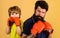 Father training his son boxing. Family workout. Sport lifestyle. Parenthood.