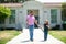 Father walking son to school. Parent and pupil of primary school schoolboy with backpack. Back to school.