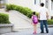 Father Walking To School With Children