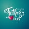 Fathers day card. White typographic text and red heart.