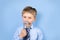 Fathers day concept - boy wears formal shirt and tie just blue background