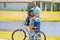 fathers parenting with son outdoor. childhood of son supported by fathers care. father hug son on bicycle at fathers day