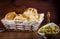 Fattoush salad with pita bread and vegetables close up in a wooden bowl. horizontal