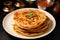 Favorite breakfast paratha, canai, or roti Maryam on a plate