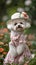 Fawn Toy dog wearing a pink dress and hat playing on grass