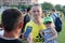 FC Kuban midfielder Vladislav Ignatiev photographed with fans at an open training session