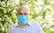 Fear of illness. strategy in battling virus. prohibition on visiting public places. senior man in medical mask. old man