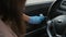 fear of infection of covid-19, female driver is wiping inside car, preventing measures