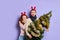 Fearful couple in festive room at christmas tree