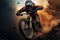 Fearless man tearing down a rugged trail on his extreme sports motorbike, sending dust and gravel flying in his wake. This dynamic