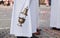 Feast of Corpus Christi procession in Poland. Priest holding Catholic thurible or censer.